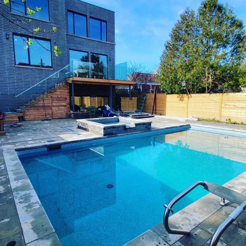 wood deck with glass railings installed